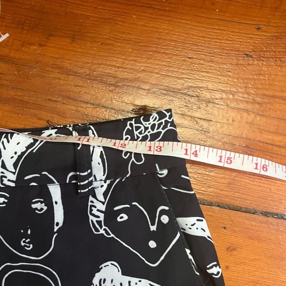 Urban Outfitters Shekou X-Small black pants with white faces EUC silky material - Picture 9 of 10